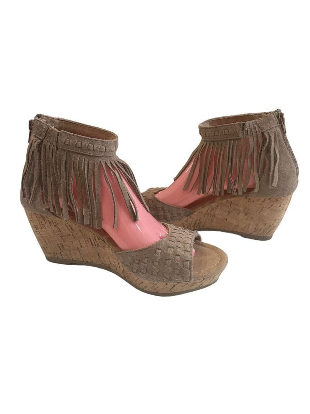 Minnetonka Sz 9 leather wedge heel sandals. Ankle strap with fringe cork heel